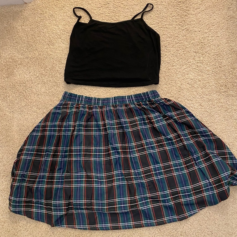 This is a two piece outfit skirt and black top